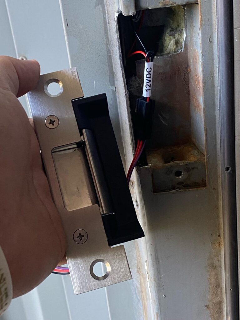Electric strike installation by reliable locksmith (15)